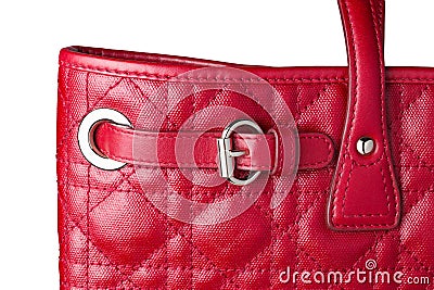 Close up of woman red leather hand bag with silver belt buckle Stock Photo