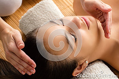 Close up of woman at reiki session. Stock Photo