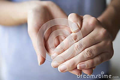 Rubbing Hands Together Stock Photo