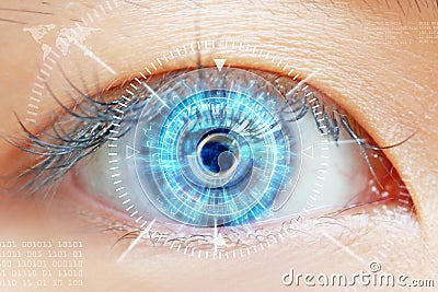 Close-up of woman`s brown eye. High Technologies in the future Stock Photo