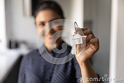 Close up of woman show keys to new home Stock Photo