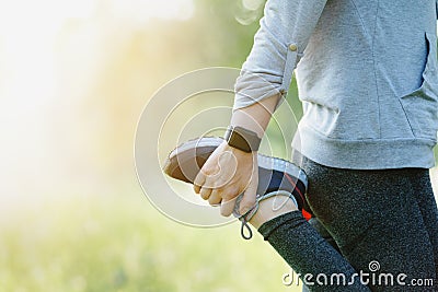 Close Up Of Woman Stretching Before Run Stock Photo
