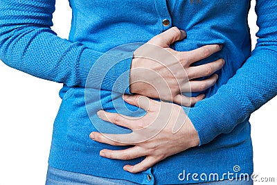 Close Up Of Woman Suffering With Stomach Pain Stock Photo