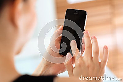 Close up of a woman using mobile smart Phone Stock Photo