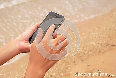 Close up of woman using mobile smart phone. Stock Photo