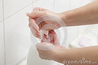 Using liquid soap Stock Photo