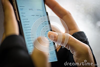 Close up of womans hands using smartphone Stock Photo