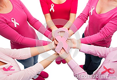 Close up of women with cancer awareness ribbons Stock Photo