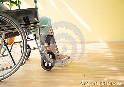 Close up of woman patients while sitting on the wheelchair at hospital Stock Photo