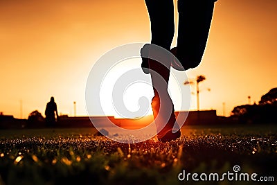 Close-up, women& x27;s feet in sneakers in nature. Concept of running, active lifestyle. Neural network AI generated Stock Photo