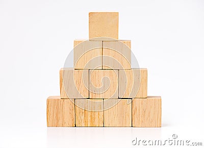 Close up at wood cube arrange in pyramid shape ,business concpt Stock Photo