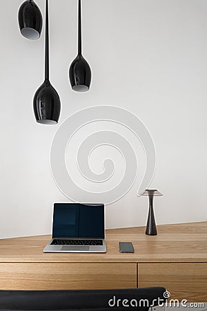 Close up on wooden corner desk Stock Photo