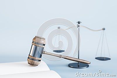Close up of wooden gavel, scales and book/journal on light blue backdrop. Lawyer, legal, justice and punishment concept. 3D Stock Photo