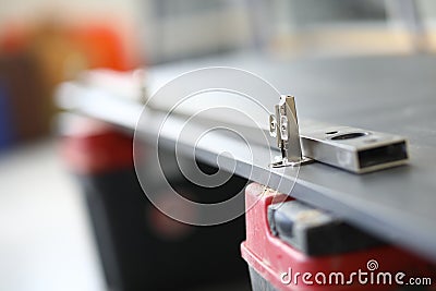 Close-up of wooden plank with metal details. Part of house furniture Stock Photo