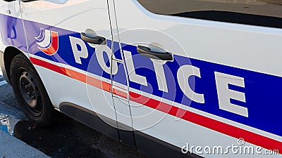 Close up of the word `Police` written on the side of a French National Police patrol vehicle Editorial Stock Photo