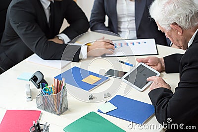 Close-up of working businesspeople Stock Photo