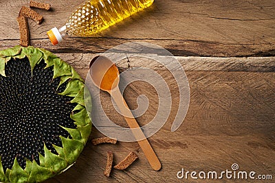 Close-up of a yellow sunflowers, bottle with oil Stock Photo