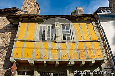 Close-up on a yellow timber framed house in Treguier, Brittany Editorial Stock Photo