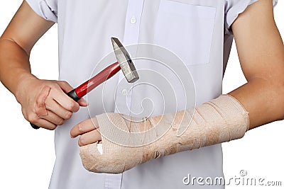 Student broken bone finger and arm by themselves with hammer. Stock Photo