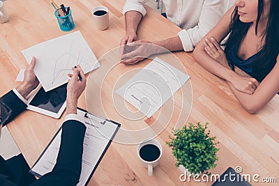 Close up of young broker showing contract for buying house Stock Photo