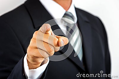 Close up of a young businessman, pointing with his finger. Stock Photo