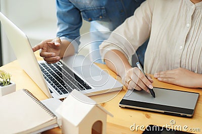 Close-up of young creative designers team working project together Stock Photo