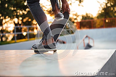 Close up of young male skateboarder training Stock Photo