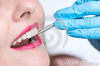 Close-up of young woman at dental visit Stock Photo