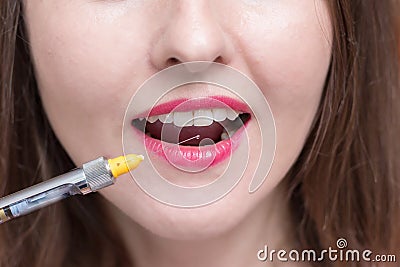 Close-up of young woman at dental visit Stock Photo