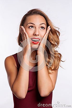 Close-up of a young woman looking surprised on Stock Photo