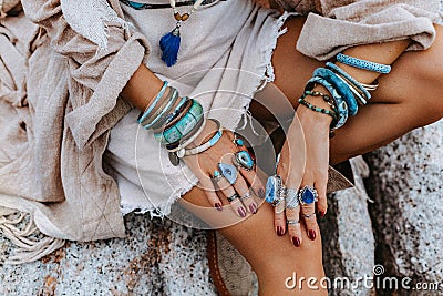 Close up of young woman with lot of boho accessories outdoors Stock Photo