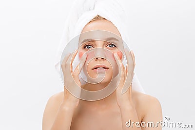 Close-up of a young woman with patches under eyes from wrinkles and dark circles. Isolated on white background Stock Photo