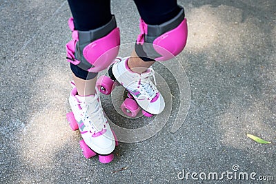 Close up of young woman with roller skating. Stock Photo