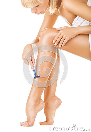 Shaving legs Stock Photo
