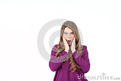 Close up of young woman who is shocked, surprised and astonished. Human facial expressions and emotions. White background. Stock Photo