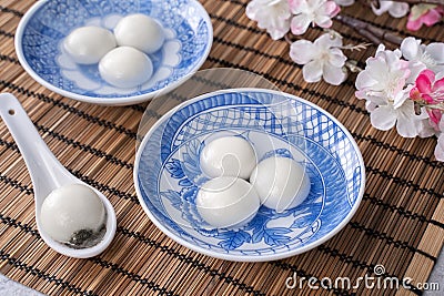 Close up of yuanxiao tangyuan in a bowl on gray table, food for Chinese Lantern Yuanxiao Festival Stock Photo