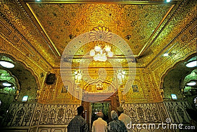 Close ups of wall with gold colours at Sachkhand Gurudwara saheb Gurdwara sahib ; nanded Editorial Stock Photo