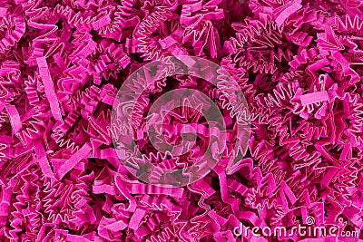 Close view of dark pink shredded crinkle paper Stock Photo