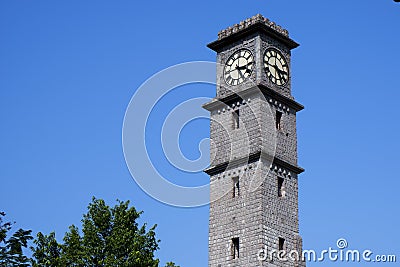 Close view of gulbarga university library clock tower isolated in nature Editorial Stock Photo