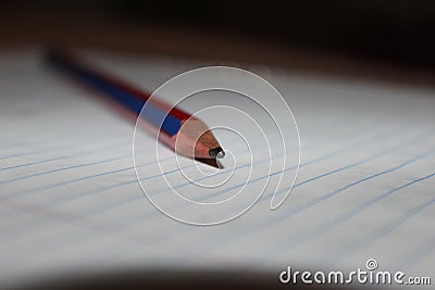 Pencil isolated over a notebook Stock Photo