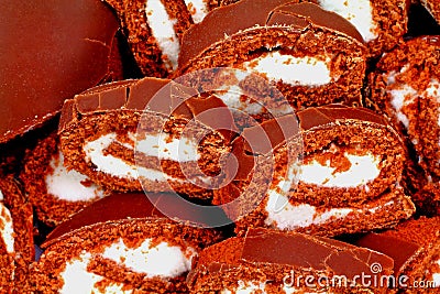 Close View of Slices of Chocolate Cream Rolls Stock Photo