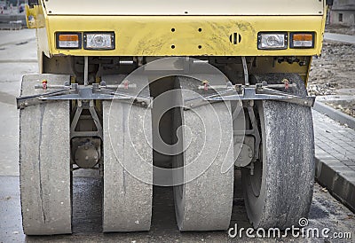 Close view of the tires of road roller. Stock Photo