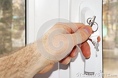 Close window key lock safety children Stock Photo