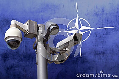 Closed circuit camera Multi-angle CCTV system against the background of the flag of NATO Stock Photo