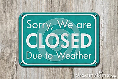 Closed due to weather sign Stock Photo