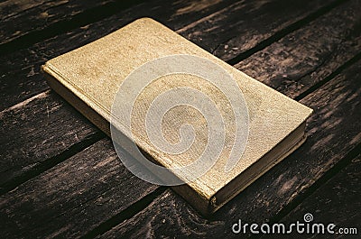 Closed golden book. Stock Photo