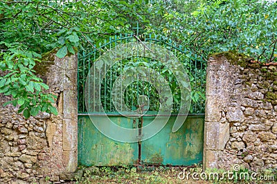 Closed iron gate of graveyard Stock Photo