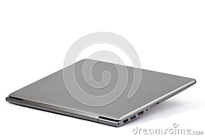 Closed lightweight silver laptop computer isolated Stock Photo