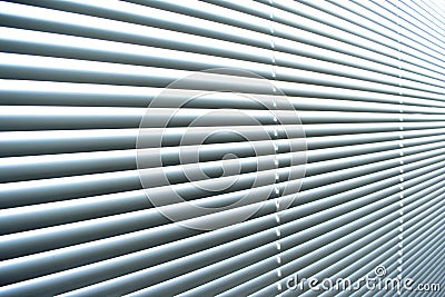 Closed metal blinds, sunlight reflection Stock Photo