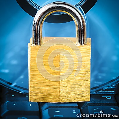 Closed padlock, keyboard and DVD - data security Stock Photo